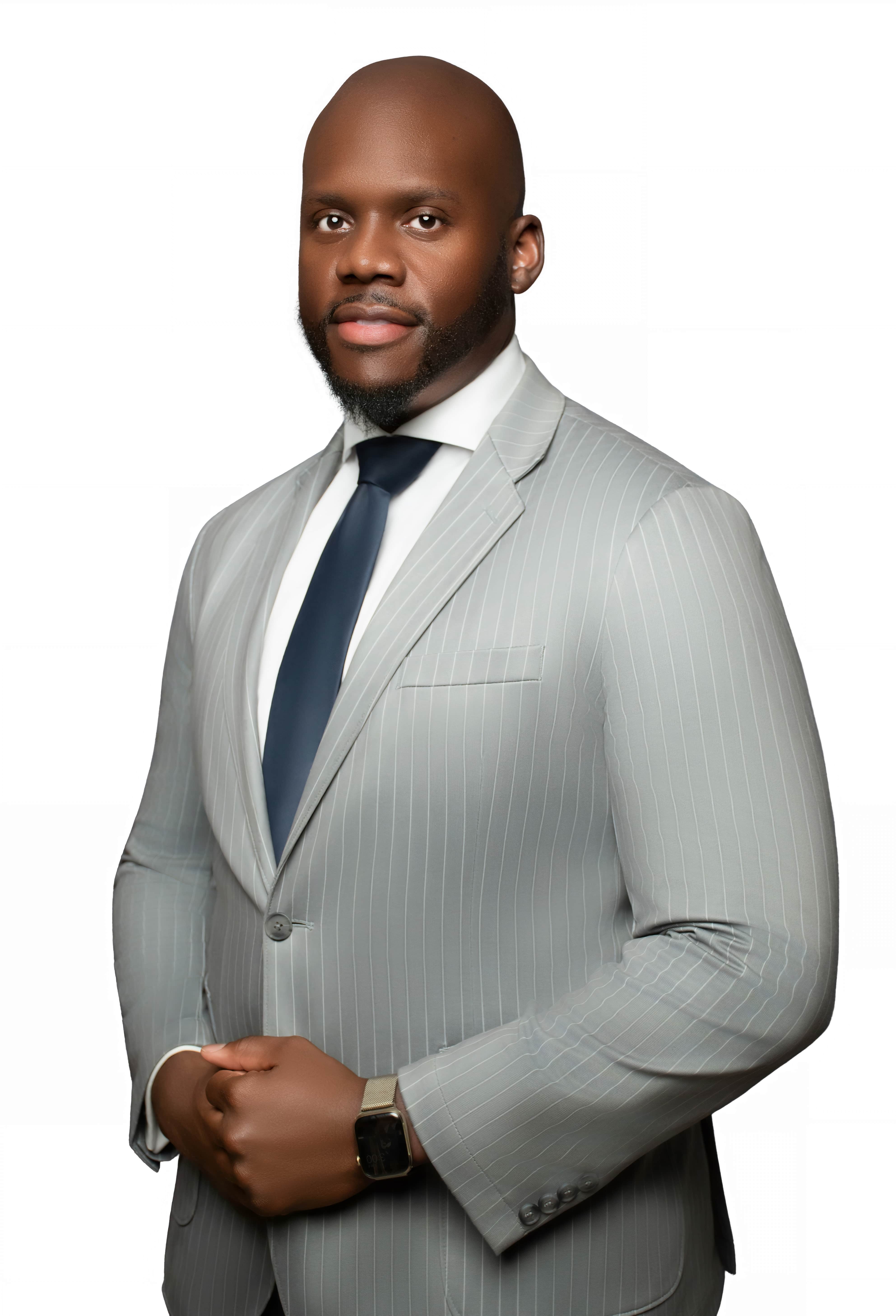 Executive business portrait in a gray pinstripe suit by DP Photography LLC, Biloxi