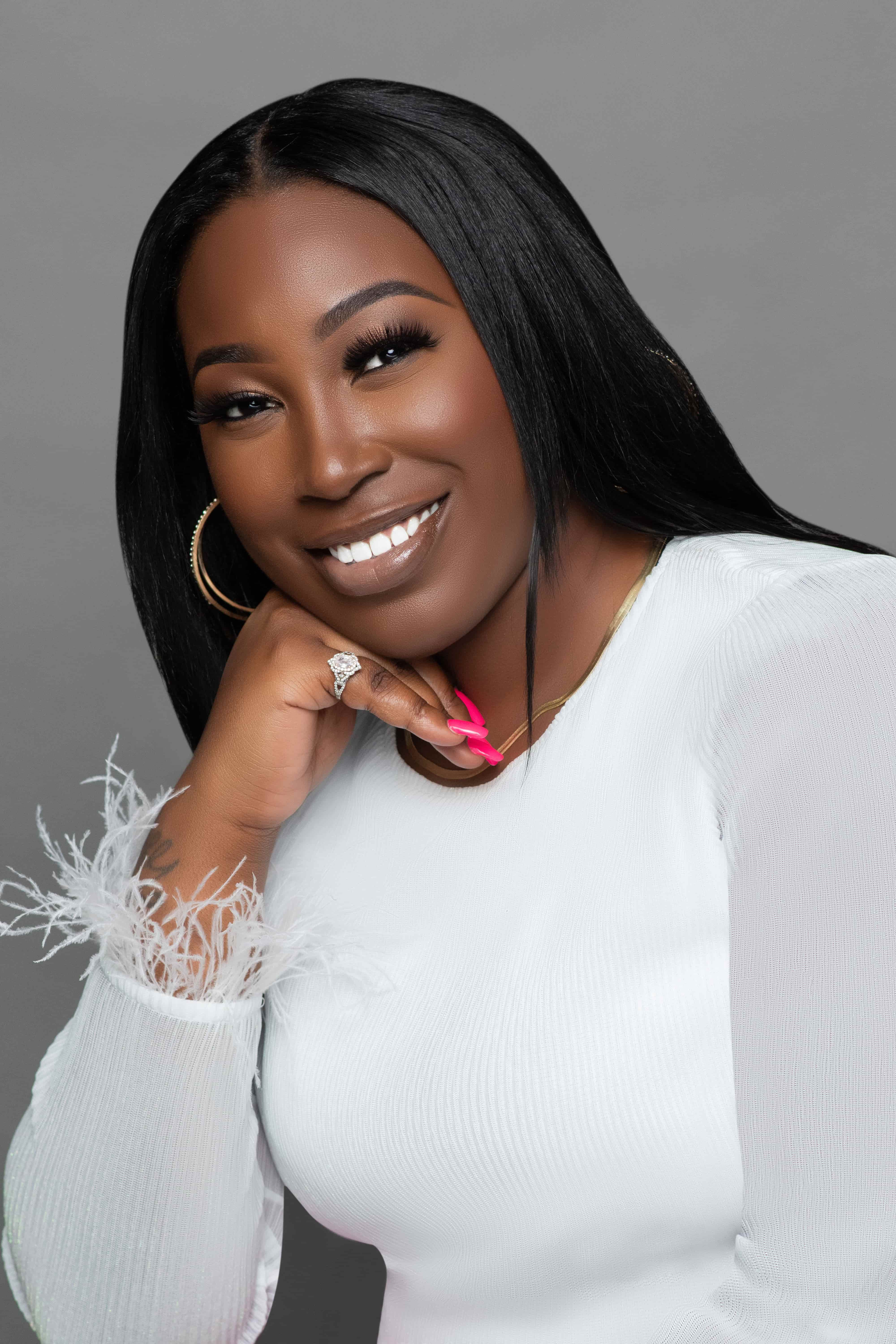 Smiling professional headshot of a woman in white by DP Photography LLC, Biloxi